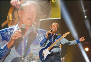  ?? (Harrison McClary/Reuters) ?? GLEN CAMPBELL performs during the Country Music Associatio­n (CMA) Music Festival in Nashville, Tennessee June 7, 2012.