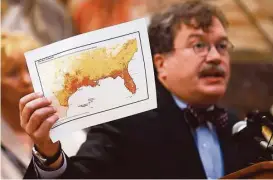  ?? Michael Ciaglo / Houston Chronicle ?? Peter Hotez, dean of the National School of Tropical Medicine at the Baylor College of Medicine, displays a map showing that Houston is among areas in the U.S. that are most vulnerable to the presence of the mosquitoes that can transmit the Zika virus.