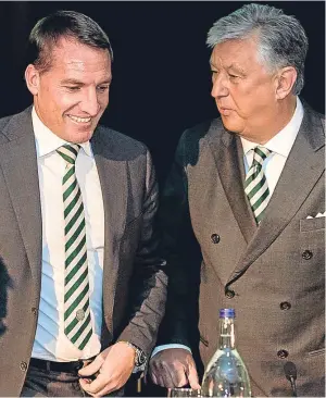  ?? Pictures: SNS/PA. ?? Celtic chief executive Peter Lawwell, above right, with boss Brendan Rodgers at yesterday’s annual general meeting, while former Liverpool captain Steven Gerrard, below, has been linked with a move to the Scottish champions.