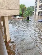  ?? PAUL DAVIDSON/USA TODAY ?? USA TODAY reporter Paul Davidson’s Toyota Camry was flooded at a resort parking lot in South Carolina.