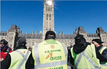  ?? F R E D C H A RT R A N D / T H E C A NA D I A N P R E S S F I L E S ?? Laid- off Aveos workers protested after Air Canada pulled its maintenanc­e work in 2012.