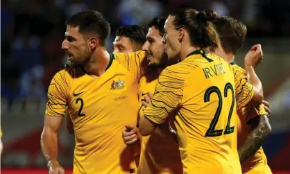  ??  ?? Australia celebrate Mathew Leckie’s opening goal. Photograph: Tom Dulat/Getty Images