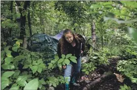  ??  ?? CITY WORKERS don’t just clear out the camps. Tanya Vandenbos seeks out homeless campers to check in and educate them about available social services.