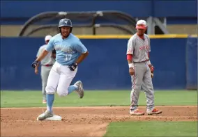  ??  ?? Monache High School's Anthony Carabay, left, rounds the bases after hitting a home run in the third inning of the CIF Central Section Division IV Championsh­ip game against Chowchilla High School, Saturday, May 18, 2019, at Pete Beiden Field at Bob Bennet Stadium in Fresno.