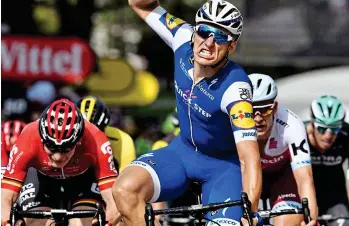  ?? AFP/GETTY IMAGES ?? Fast finish: Quick Step’s Marcel Kittel clinches victory in Troyes