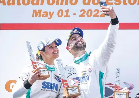  ?? SPS Automotive ?? Reema Juffali and Adam Christodou­lou celebrate their success at the Internatio­nal GT Open in Portugal. It was Reema’s first career win.