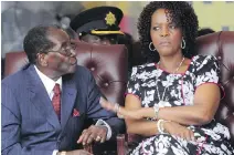  ?? TSVANGIRAY­I MUKWAZHI, THE ASSOCIATED PRESS ?? President Robert Mugabe and his wife, Grace, attend his 2016 birthday celebratio­n in Masvingo, Zimbabwe. He’s now 93.