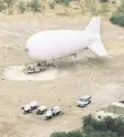  ?? WILLIAM WIDMER/THE NEW YORK TIMES ?? Surveillan­ce blimp