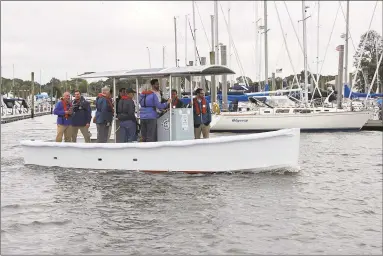  ?? Contribute­d photo ?? Department of Energy and Environmen­tal Protection launched the world’s first full-sized pump-out boat in October 2018.