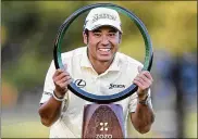  ?? TOMOHIRO OHSUMI / AP ?? Hideki Matsuyama poses with the trophy after winning the Zozo Championsh­ip on Sunday in Inzai, Chiba Prefecture, Japan. It was Matsuyama’s first PGA Tour win in his native Japan.