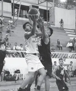  ?? (Photo by SBP-XI/CSL Escandor Cup) ?? KARLO Quidlat (with ball) scored 22 points to go along with five boards and two steals to lift the University of Mindanao Wildcats past the Agro Industrial Foundation Sailors, 89-82
