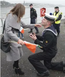  ??  ?? Jordan Culbert, from Birr, Co Offaly, gets down on bended knee to propose to girlfriend Alison Parsons and (right) with his new fiancée. Photos: Michael Mac Sweeney/Provision