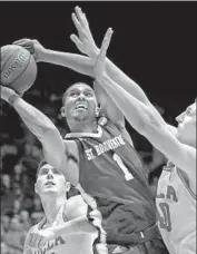  ??  ?? IDRIS TAQQEE and the Bonnies took advantage of turnovers and poor shooting by the Bruins.