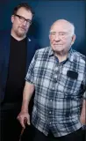  ?? PHOTO BY REBECCA CABAGE/INVISION/AP ?? Ed Asner, right and his son Matt Asner pose for a portrait at Golden Apple Comics in Los Angeles to promote an internet comic-art auction to raise funds for The Ed Asner Family Center.