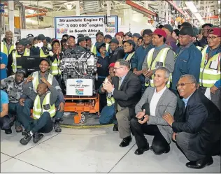  ??  ?? MAKING MILLIONS: An historic moment at the Ford Struandale engine plant as workers proudly display the three-millionth engine that left the production line