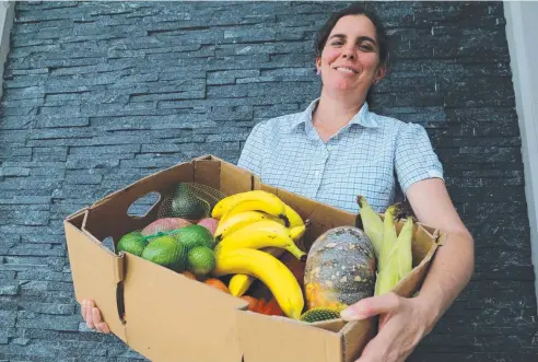  ??  ?? FRUITFUL ENTERPRISE: Tablelands woman Erica Hughes has spearheade­d the Farmer Meets Foodie app.