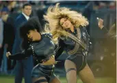  ?? MARK J. TERRILL/AP 2007; MATT SLOCUM/AP 2016 ?? Above right: Beyoncé included her Black power anthem “Formation” during her performanc­e at the Super Bowl.