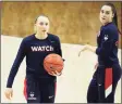  ?? David Butler II / USA Today ?? UConn’s Paige Buckers, left, and Nika Muhl are two of several freshmen will make their postseason debuts on Saturday against St. John’s.