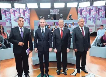  ?? INE VIA AP ?? In this photo released by the National Electoral Institute, Mexican presidenti­al candidates, from left, independen­t Jaime Rodriguez, known as “El Bronco,” Ricardo Anaya of the Forward for Mexico Coalition, Jose Antonio Meade of the Institutio­nal Revolution­ary Party, and Andres Manuel Lopez Obrador, with the MORENA party, attend the second of three debates in Tijuana, Mexico, on May 20. Mexico will hold general elections on July 1.