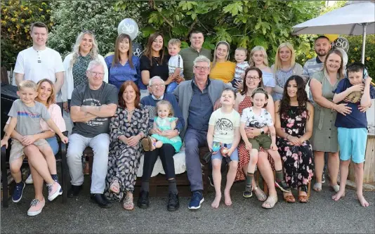  ??  ?? Bill O’Reilly, Ballyboy, The Ballagh, with his family at his 80th birthday party.