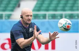  ??  ?? BOTTOM Scotland coach Gregor Townsend takes part in a training session.