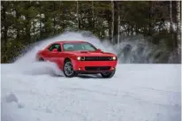  ?? Photo courtesy of Dodge ?? The 2017 Dodge Challenger GT AWD may not pack the punch of its burlier Challenger siblings, but it's the only one you can spin through the snow with confidence.