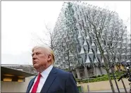  ?? ALASTAIR GRANT/AP PHOTO ?? The Madame Tussauds wax figure of U.S. President Donald Trump is seen outside the new U.S. Embassy in Nine Elms in London on Friday. Trump says he canceled an upcoming trip to London because he doesn’t like the choice of a new embassy. Some British...