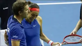  ?? (Photos EPA/MaxPPP et AFP) ?? Deux matchs, deux victoires pour Caroline Garcia. Julien Benneteau a pu savourer son premier week- end comme capitaine.