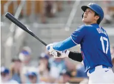  ?? AP ?? Shohei Ohtani a frappé son premier coup de circuit dans l’uniforme des Dodgers de Los Angeles. -