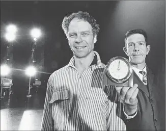  ?? Jack Mitchell Getty Images ?? U.S. CHOREOGRAP­HER Merce Cunningham, left, and composer John Cage were early supporters of Ichiyanagi and featured his piece “Sapporo” in the dance “Story,” which premiered at UCLA.