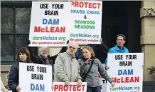  ?? GAVIN YOUNG ?? About 50 people from the Bragg Creek and Springbank area protested in front of McDougall Centre on Friday.