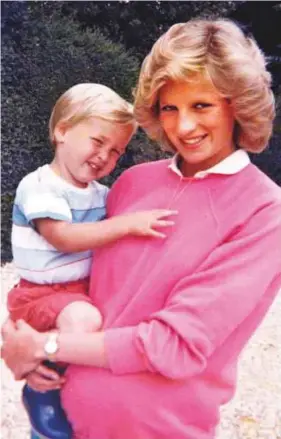  ?? Courtesy ITV ?? The late Diana, Princess of Wales, holding Prince William while pregnant with Prince Harry.