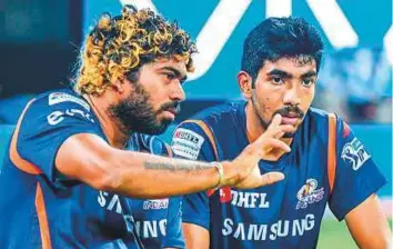  ?? Courtesy: Mumbai Indians website ?? Jasprit Bumrah with Lasith Malinga. Skipper Rohit Sharma spoke in support of the pacer after his lacklustre performanc­e against Chennai.