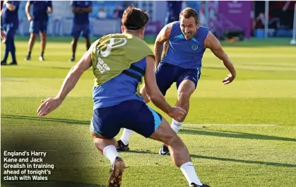  ?? ?? England’s Harry Kane and Jack Grealish in training ahead of tonight’s clash with Wales