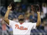  ?? MATT SLOCUM — THE ASSOCIATED PRESS ?? Phillies relief pitcher Hector Neris — filthy hat and all — celebrates after the final out Tuesday night against the Dodgers. Neris is 16-for-16 in save opportunit­ies this season.