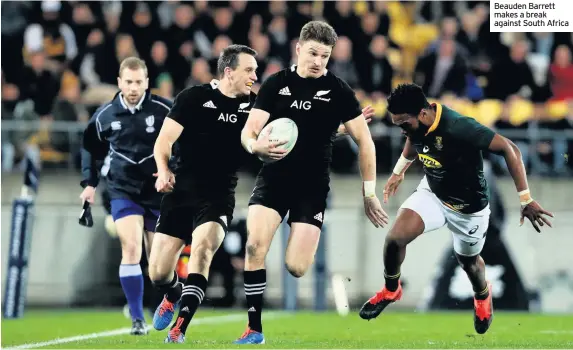  ??  ?? Beauden Barrett makes a break against South Africa