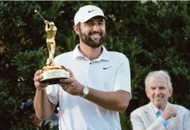  ?? Marta Lavandier/Associated Press ?? Scottie Scheffler matched the biggest comeback and lowest closing round to become the first repeat winner of The Players Championsh­ip.