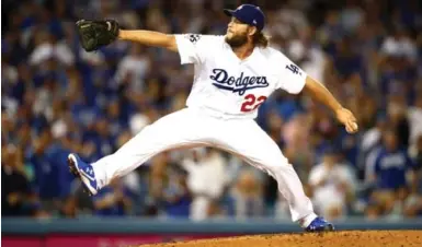  ?? EZRA SHAW/GETTY IMAGES FILE PHOTO ?? Pitcher Clayton Kershaw of the Los Angeles Dodgers may have an advantage over his peers because he’s left-handed.