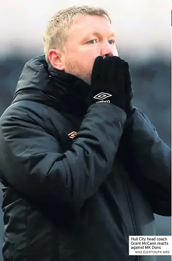  ?? MIKE EGERTON/PA WIRE ?? Hull City head coach Grant Mccann reacts against MK Dons