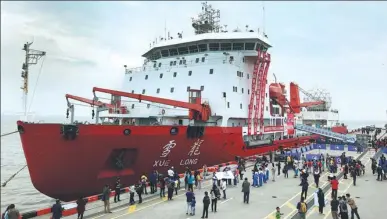  ?? FANG ZHE / XINHUA ?? Polar research icebreaker Xuelong at dock in Shanghai on Saturday, after completing China’s 34th Antarctic research expedition.