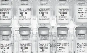  ?? AP ?? Vials of the new Johnson & Johnson Janssen COVID-19 vaccine.