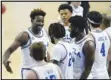  ?? Associated Press ?? TEAMWORK —
UCLA forward Kenneth Nwuba, left, celebrates with teammates after a 91-61 win over Washington State on Thursday in Los Angeles. The Bruins moved to 6-0 in Pac-12 play.