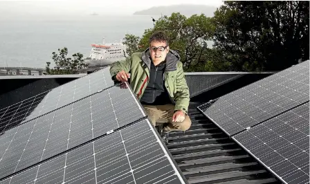  ?? PHOTO: ROSS GIBLIN/ STUFF ?? Craig Burt is part of a cluster of homeowners trialling the ‘’microgrid’' idea with Contact Energy and Wellington Electricit­y.