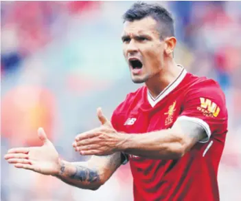  ?? REUTERS ?? Dejan Lovren Cijelu karijeru prate ga kiksevi, ali je ipak jedan od najpouzdan­ijih obrambenih igrača Liverpoola