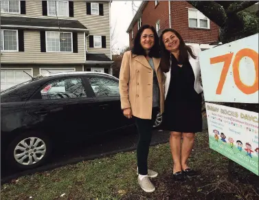  ?? Erik Trautmann / Hearst Connecticu­t Media ?? Gladys Contreras and her sister Dora Ramos in front of their day care facility in Stamford on Thursday.