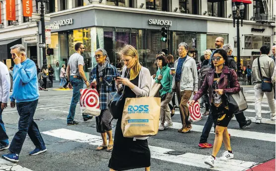  ?? CHRISTIE HEMM KLOK/THE NEW YORK TIMES ?? The demographi­c handover — from millennial­s to Gen Z — is good news for delivery services, gadget makers and the so-called gig economy.