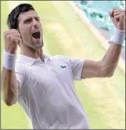  ?? AP/KRISTY WIGGLESWOR­TH ?? Novak Djokovic celebrates winning the Wimbledon men’s championsh­ip against Kevin Anderson on Sunday in London. It is Djokovic’s 13th major trophy, the fourth-highest total in the history of men’s tennis.