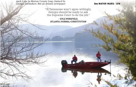  ?? STAFF PHOTO BY DAN HENRY ?? Walker County, Ga., residents Jake Everett, left, and Gene Boshears fish Wednesday on Nickajack Lake near the Georgia state line.