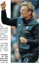  ?? Picture: AFP ?? UNIMPRESSE­D: Liverpool manager Jurgen Klopp gestures on the touchline after Salah scores their first goal against Tottenham Hotspur at Wembley Stadium