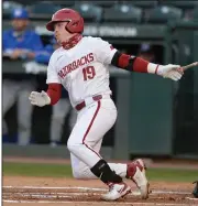  ?? (NWA Democrat-Gazette/Andy Shupe) ?? Junior designated hitter Charlie Welch hits a two RBI single for Arkansas during the Razorbacks’ victory over Memphis on Tuesday at Baum-Walker Stadium in Fayettevil­le. See more photos at arkansason­line.com/324basebal­l.